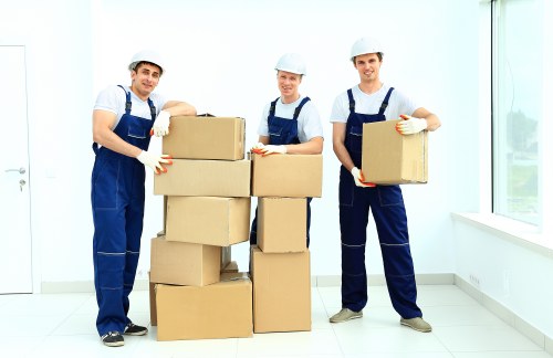Office relocation planning in Hackney with moving boxes and business furniture