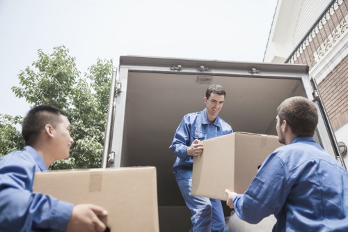 Local moving truck serving residential streets in Hackney