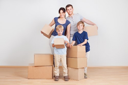 Student boxes and furniture prepared for transport in Hackney