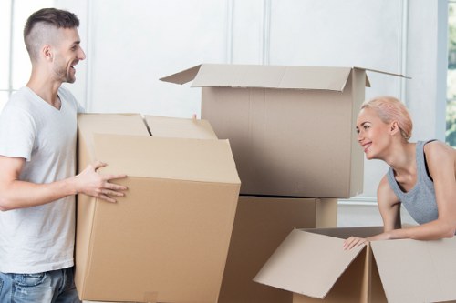 Moving furniture through a narrow Hackney staircase with protective care