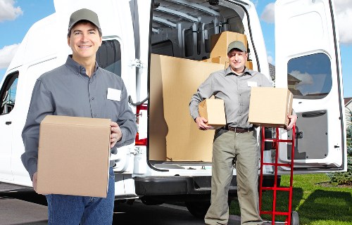 Local moving van loading furniture for a Hackney property relocation