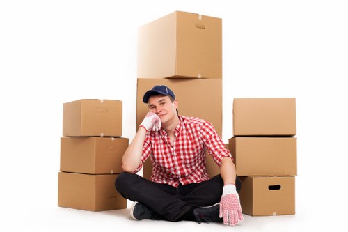 Team carrying desks and boxes during an office move